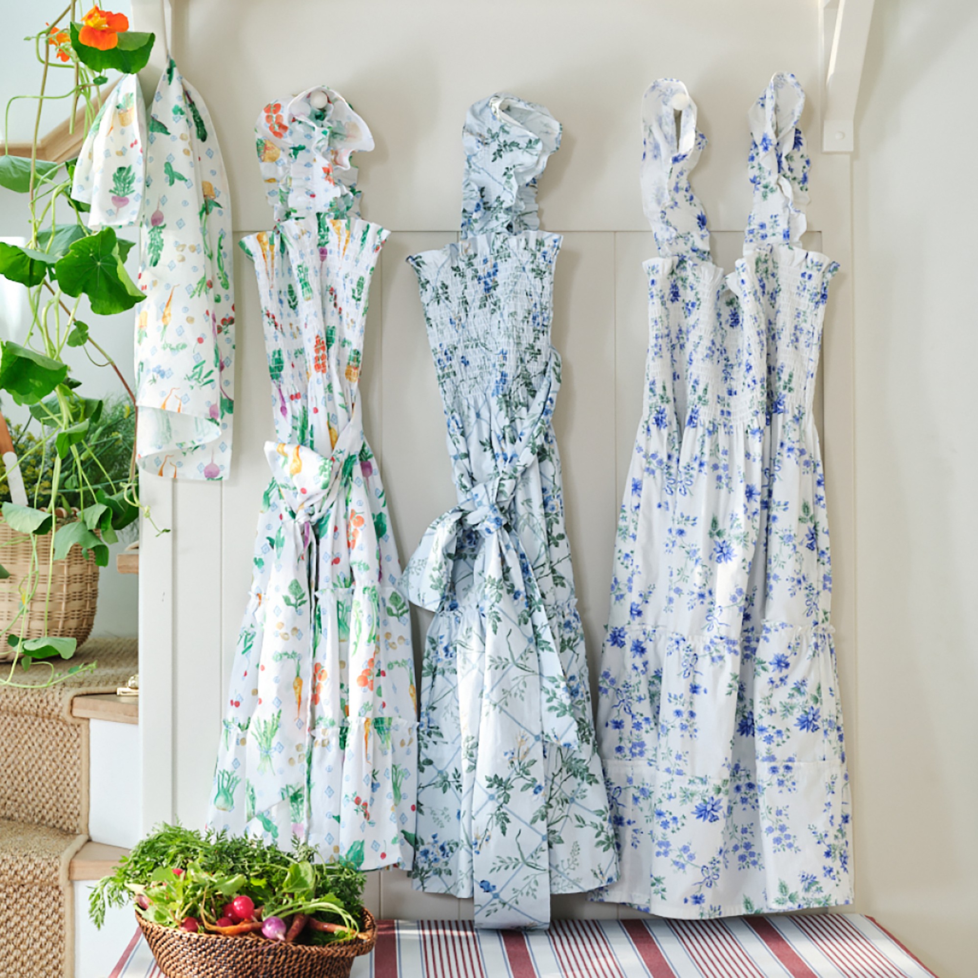 Hill House x Williams Sonoma apron prints in Farmer's Market, Climbing Vine and Dewdrop Bouquet