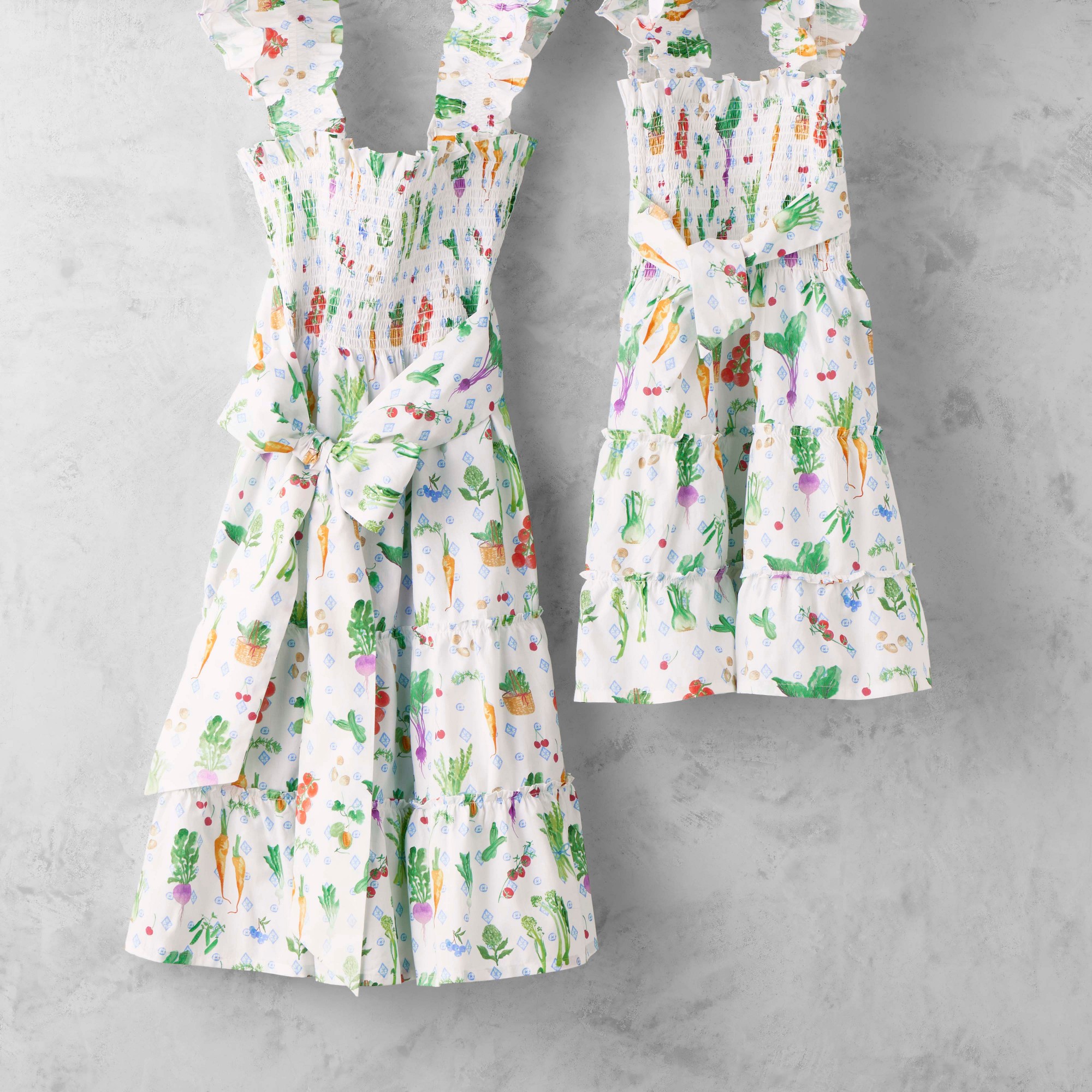Matching adult and children's Hill House x Williams Sonoma Farmer's Market aprons