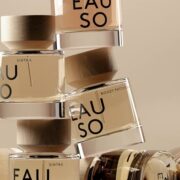 Eauso fragrance bottles arranged against a neutral background