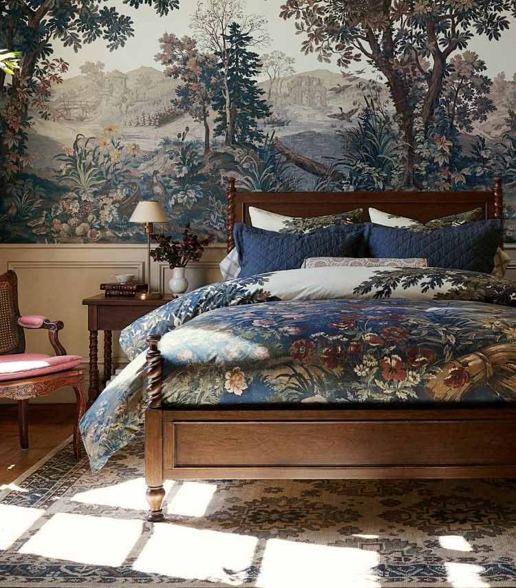 Pottery Barn Kravet Folly Collection bedroom with scenic botanical bedding and wallpaper