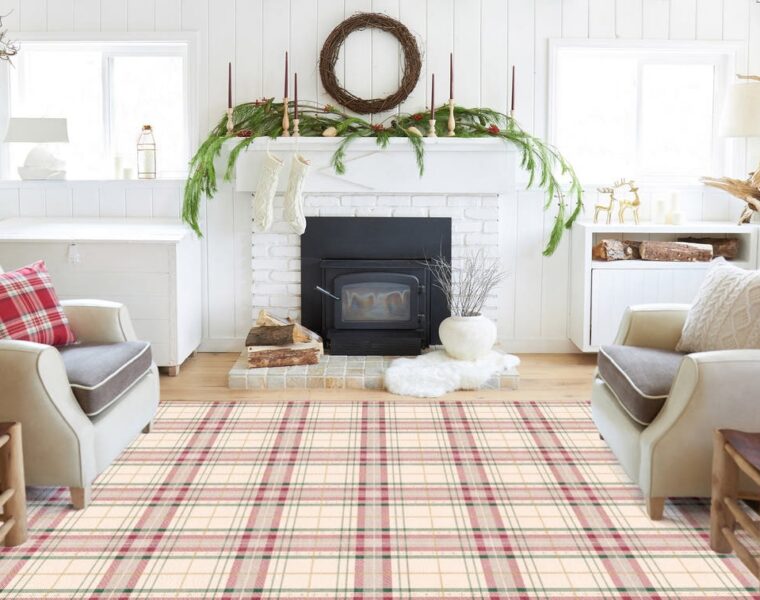 Cream tartan rug in a bright holiday living room with a fireplace and two armchairs